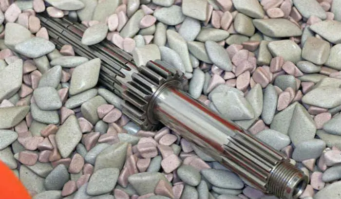 Polishing-gears-reduces-wear-and-increases-power-trough-tub-vibratory-finishing